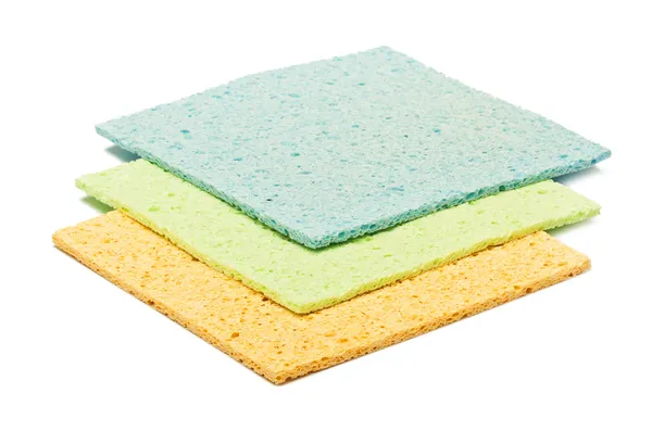 Colorful kitchen sponges are isolated on a white — Stock Photo, Image