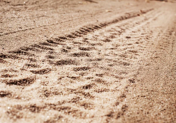 Car tire track in gravel — Stock Photo, Image