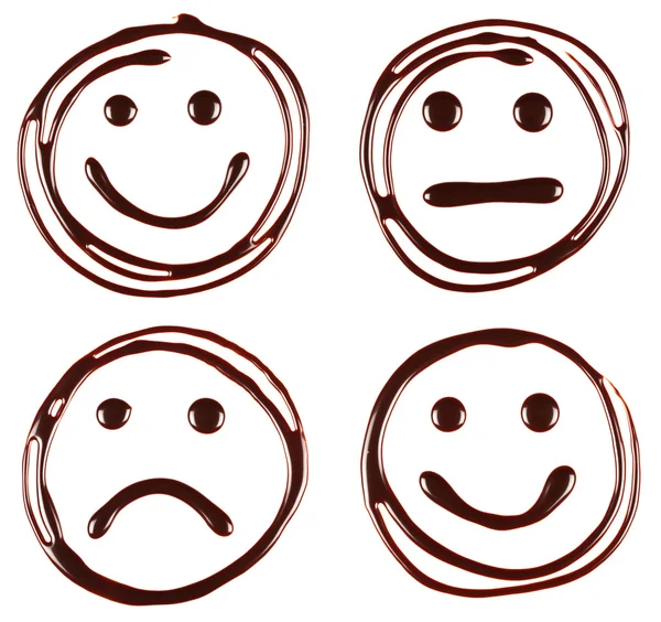 Uppsättning av smiley ansikten gjorda av choklad sirap är på vit bakgrund — Stockfoto