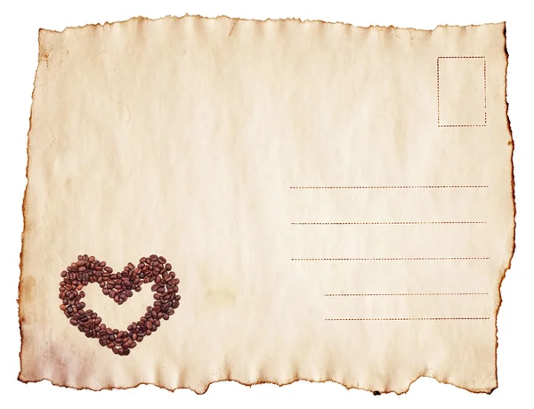 Винтажная выжженная открытка с кофейными зернами сердца — стоковое фото