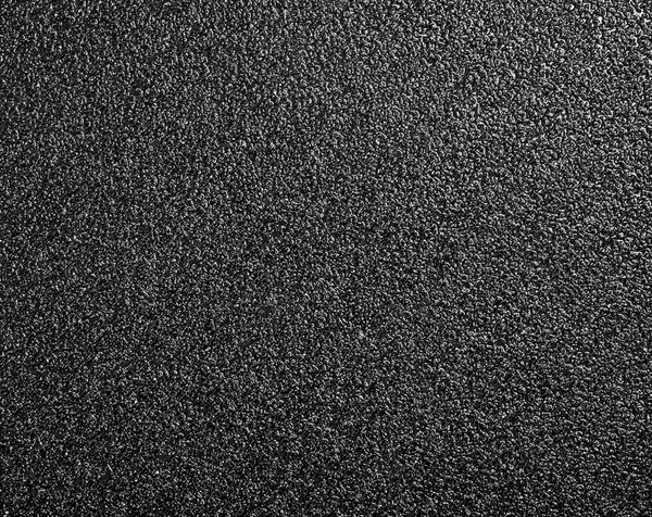 Svart sandpapper bakgrund — Stockfoto