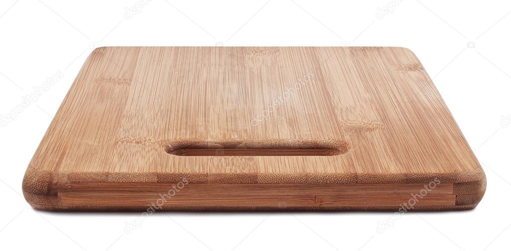 Brown cutting bamboo board used for cooking. Wood texture.