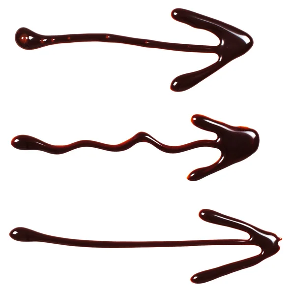 Verzameling van chocolade saus pijlen — Stockfoto