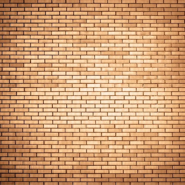 Laranja parede de tijolo fundo — Fotografia de Stock