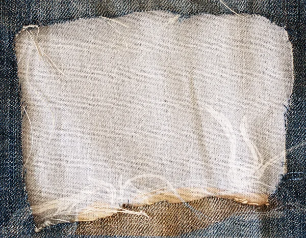 Mavi yırtık kot pantolon ve kumaş dokusu — Stok fotoğraf