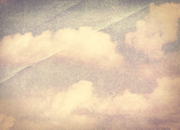 Cloud and sky on crumpled paper. — Stock Photo, Image