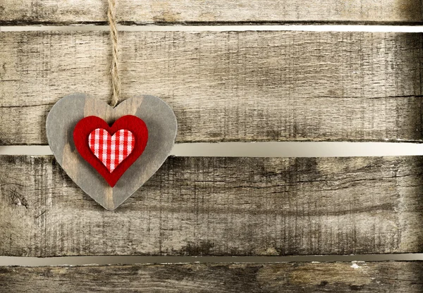 Red heart on old wooden background — Stock Photo, Image