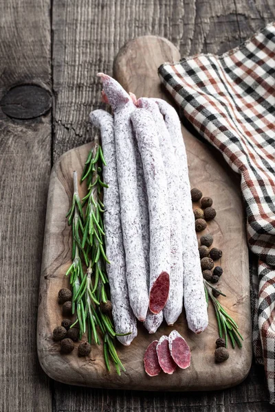 Spanish Dry Cured Sausages Salami Rosemary Spices Wooden Board — Stock Photo, Image