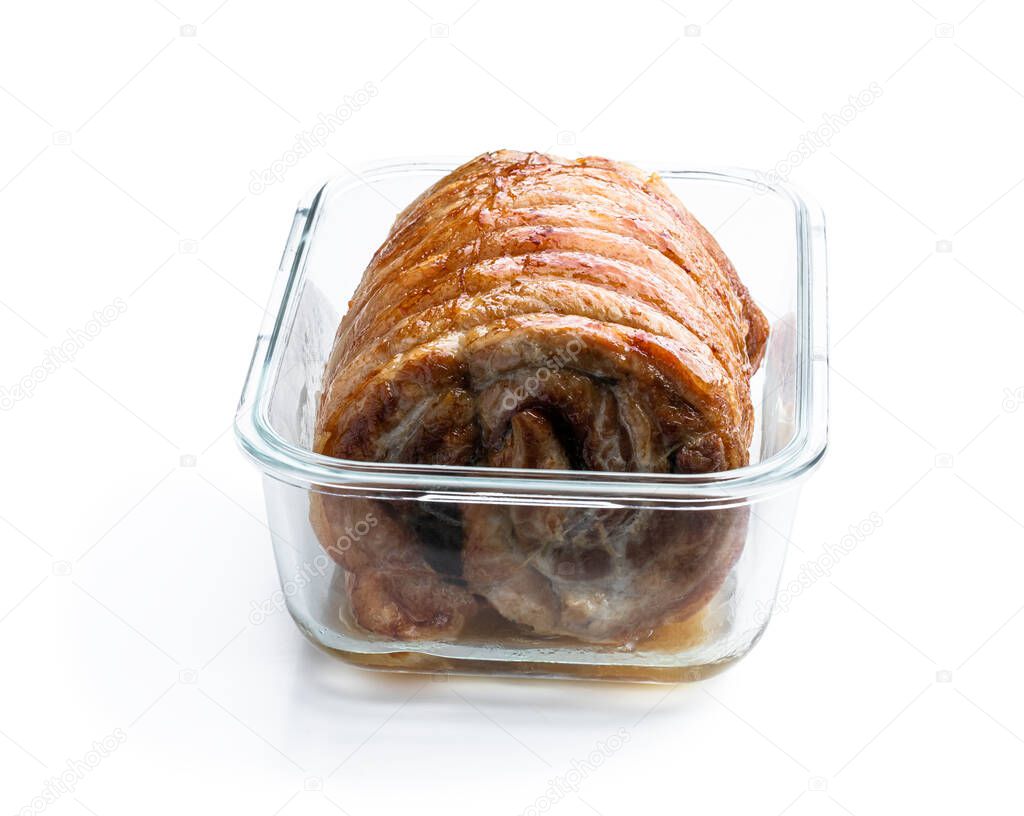 Roasted  pork meat roll with herbs and spices isolated on white 