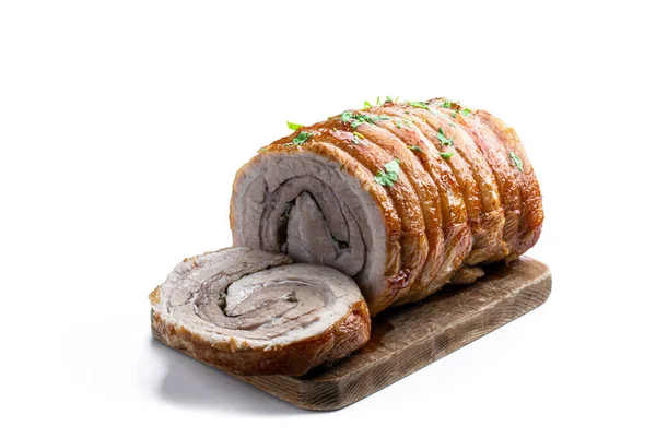 Roasted  pork meat roll with herbs and spices isolated on white