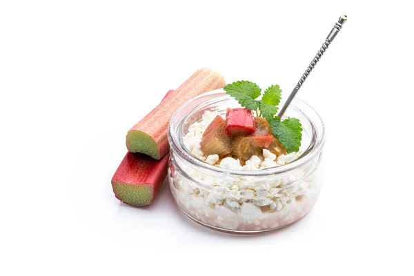 Homemade  cottage cheese with rhubarb jam isolated on white