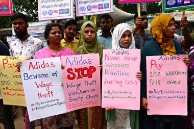 Activists of Five Garments workers organization stage a protest rally against Adidas brand demanding due wages11.7 million us dollars to workers of eight factories supplied by Adidas brand in Cambodia, in Dhaka, Bangladesh, August 18, 2022