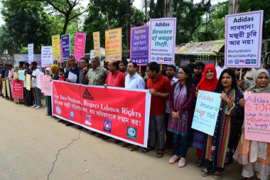 Activists of Five Garments workers organization stage a protest rally against Adidas brand demanding due wages11.7 million us dollars to workers of eight factories supplied by Adidas brand in Cambodia, in Dhaka, Bangladesh, August 18, 2022