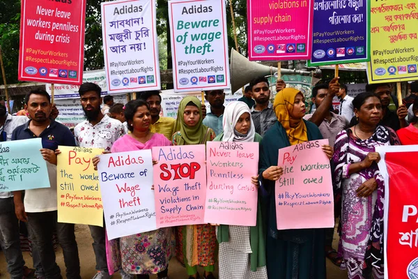 Activists of Five Garments workers organization stage a protest rally against Adidas brand demanding due wages11.7 million us dollars to workers of eight factories supplied by Adidas brand in Cambodia, in Dhaka, Bangladesh, August 18, 2022