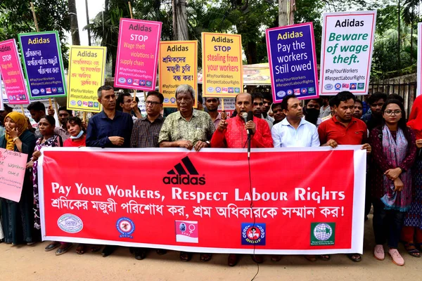 Activists of Five Garments workers organization stage a protest rally against Adidas brand demanding due wages11.7 million us dollars to workers of eight factories supplied by Adidas brand in Cambodia, in Dhaka, Bangladesh, August 18, 2022