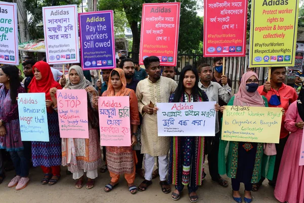 Activists of Five Garments workers organization stage a protest rally against Adidas brand demanding due wages11.7 million us dollars to workers of eight factories supplied by Adidas brand in Cambodia, in Dhaka, Bangladesh, August 18, 2022