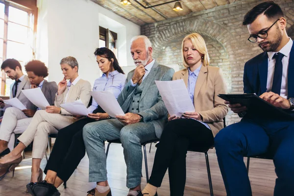 Business people waiting for job interview