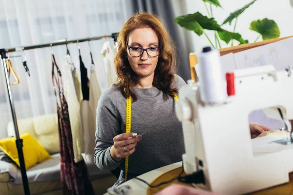 Cheerful Young Woman Sewing While Sitting Her Working Place Home — Stock Photo, Image