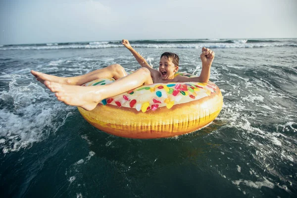 Joyful Child Inflatable Ring Ride Breaking Wave Travel Lifestyle Swimming — Stock Photo, Image