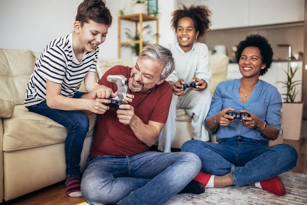 Smiling Family Enjoying Time Together Home Sitting Sofa Living Room — Foto de Stock