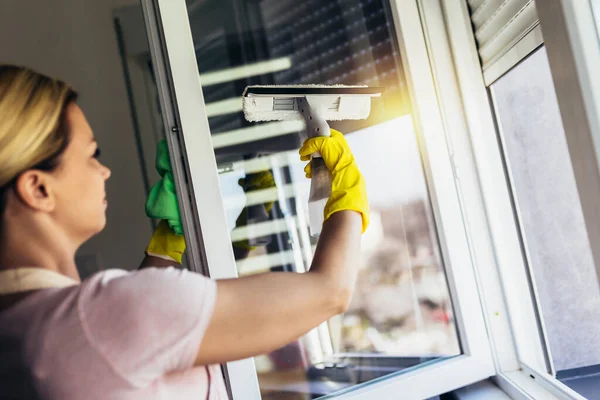 Happy Beautiful Woman Wearing Protective Gloves Cleaning Window Spraying Cleaning —  Fotos de Stock