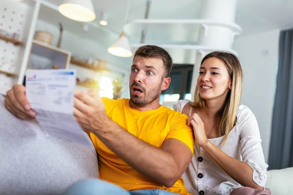 Worried Couple Checking Bank Account Trouble Sitting Couch Living Room — Stok Foto