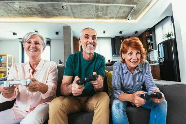 Group Middle Age Friends Smiling Happy Playing Video Game Home — Stock Photo, Image