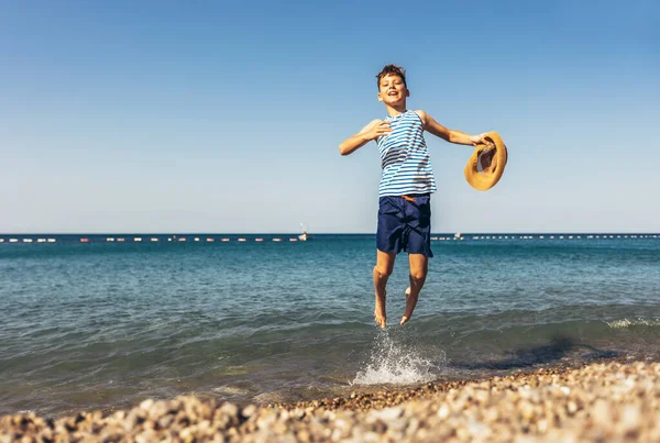 Boy Jumping Beach Having Fun Vacation — 图库照片