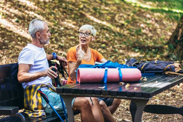 Mature Couple Sitting Drink Coffee While Resting Forest Hiking — Foto Stock