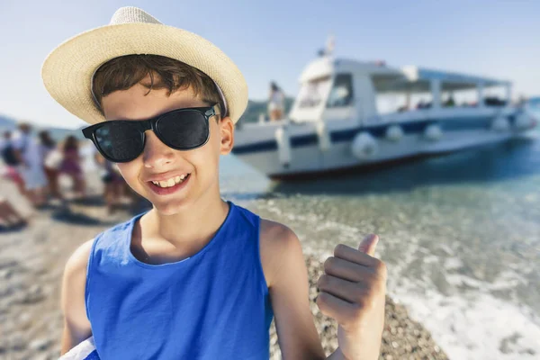 Portrait Smiling Boy Beach Tourist Boat Background — Stockfoto