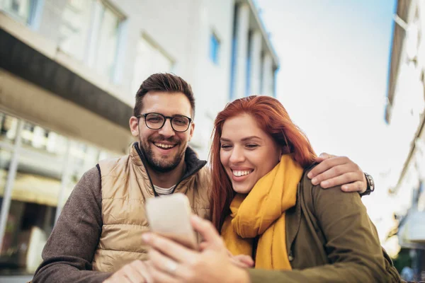 Happy Young Couple Using Phone Together Coffee Shop Young Man — Stockfoto