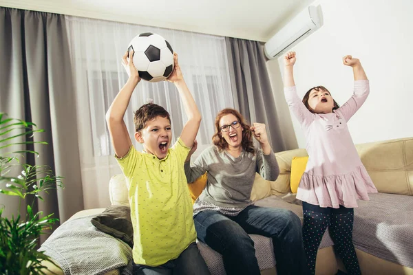 Mother Children Raising Arms Screaming While Watching Football Match Celebrating — Stok fotoğraf