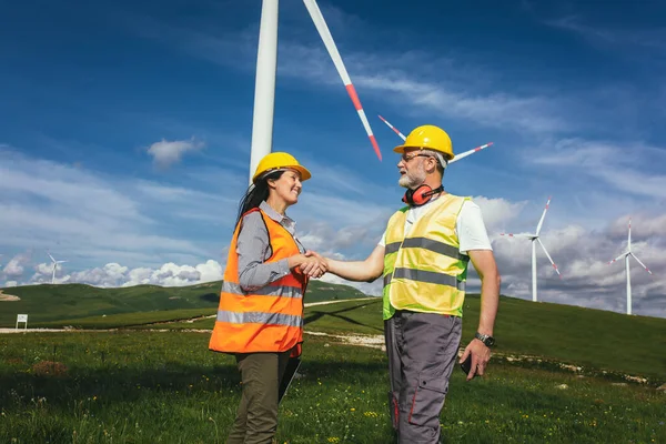 Windmill engineer inspection and progress check wind turbine at construction site