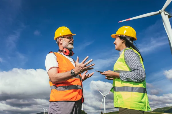 Windmill engineer inspection and progress check wind turbine at construction site