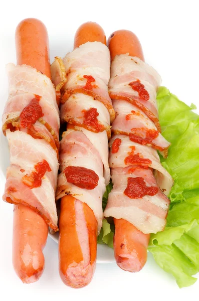 Korv insvept i bacon — Stockfoto