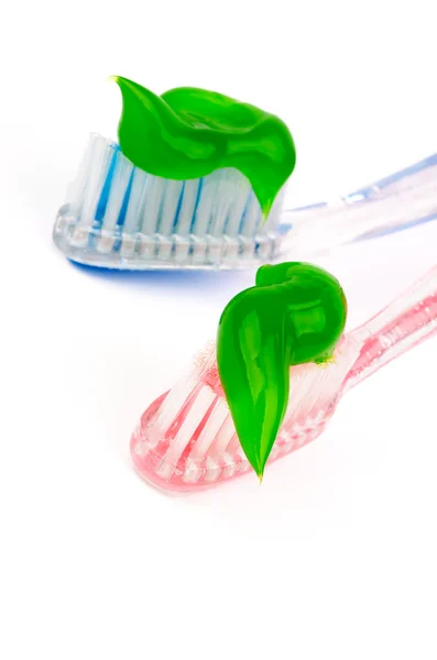 Pasta de dientes en Cepillos de dientes —  Fotos de Stock