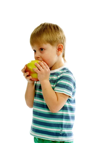 Little Boy Eating an Apple Stock Photo