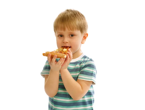 Niño pequeño con pizza — Foto de Stock