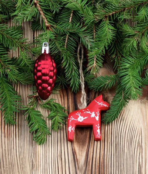 Christmas Decoration Decorative Cone Red Horse Spruce Branch Closeup Wooden — Stock Photo, Image