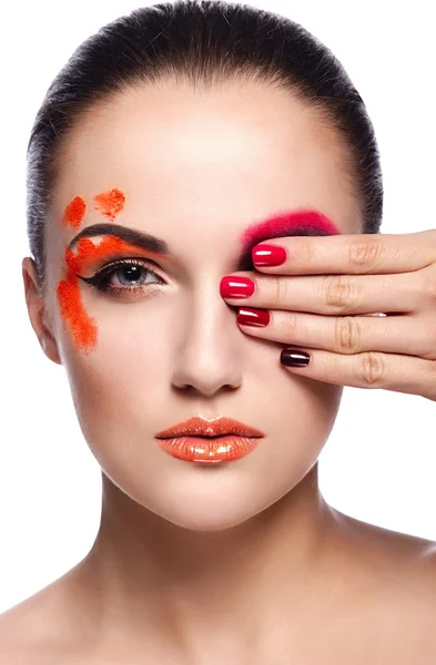 Glamor closeup portrait of beautiful sexy brunette young woman model with orange lips,bright unusual creative plastic makeup, with perfect clean skin with colorful nails isolated on white — Stock Photo, Image