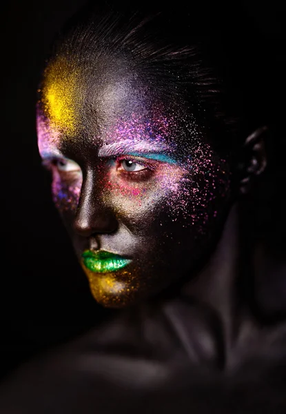 Art photo of beautiful model woman with creative plastic unusual black mask bright colorful makeup with black face — Stock Photo, Image