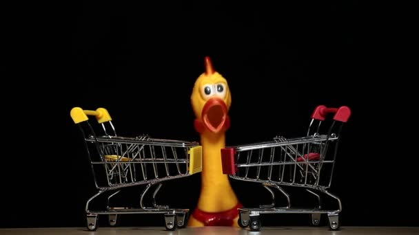 Footage Trolley Rubber Chicken Dark Background — Vídeo de Stock
