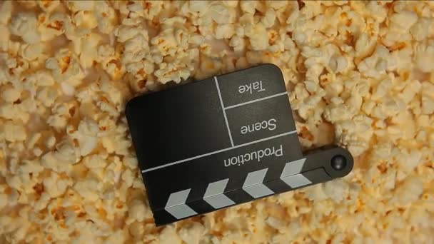 Beeldmateriaal Van Popcorn Clapper Board — Stockvideo