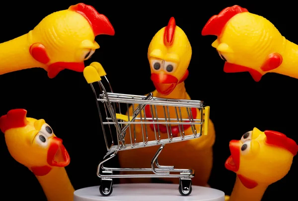 Image Trolley Rubber Chicken Dark Background — Stockfoto