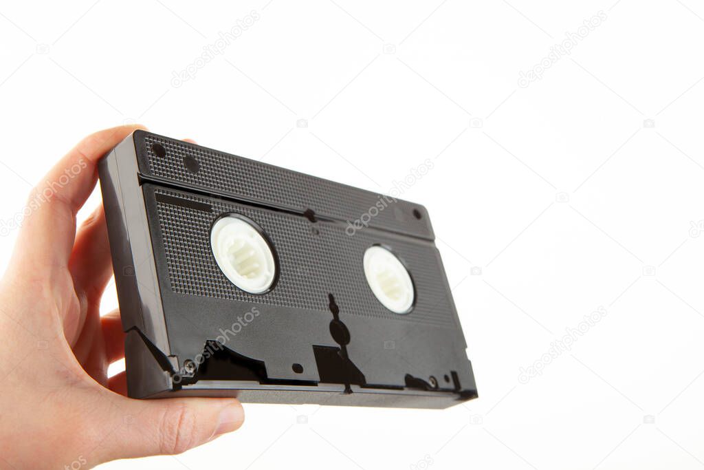 image of vhs tape hand white background