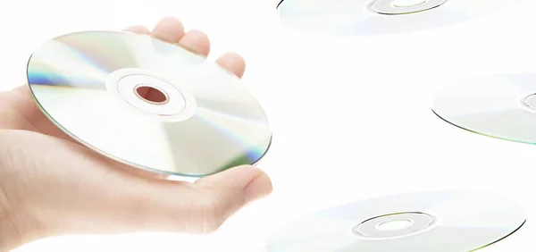 Cdディスクの手の白い背景の画像 — ストック写真
