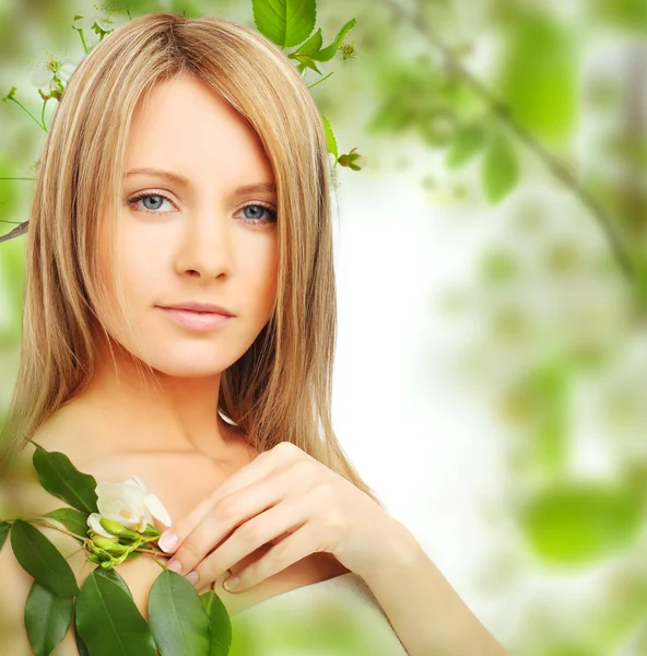 Woman on blossom background — Stock Photo, Image