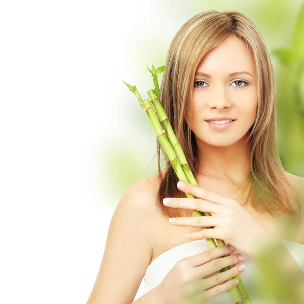 Woman with green bamboo — Stock Photo, Image
