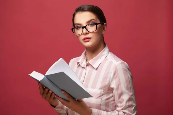 Cute Woman Glasses Reading Book Red Studio Portrait — Fotografia de Stock