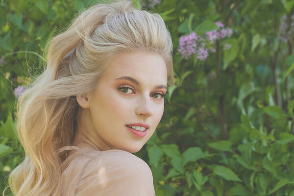 Young carefree woman blonde model portrait